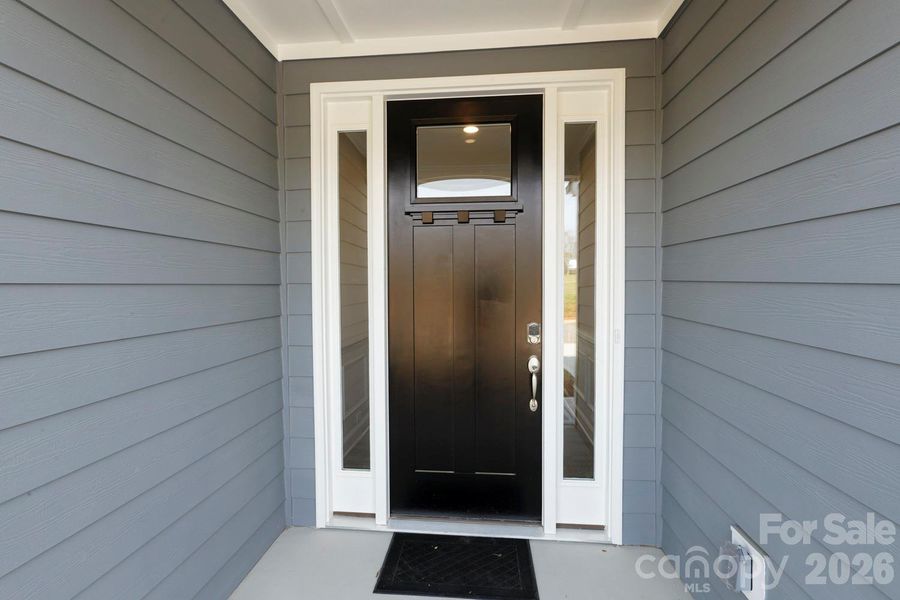 Exterior details and patio area of a home in , Mill Spring (Image 4). Exterior details and patio area of a home in , Mill Spring (Image 4).