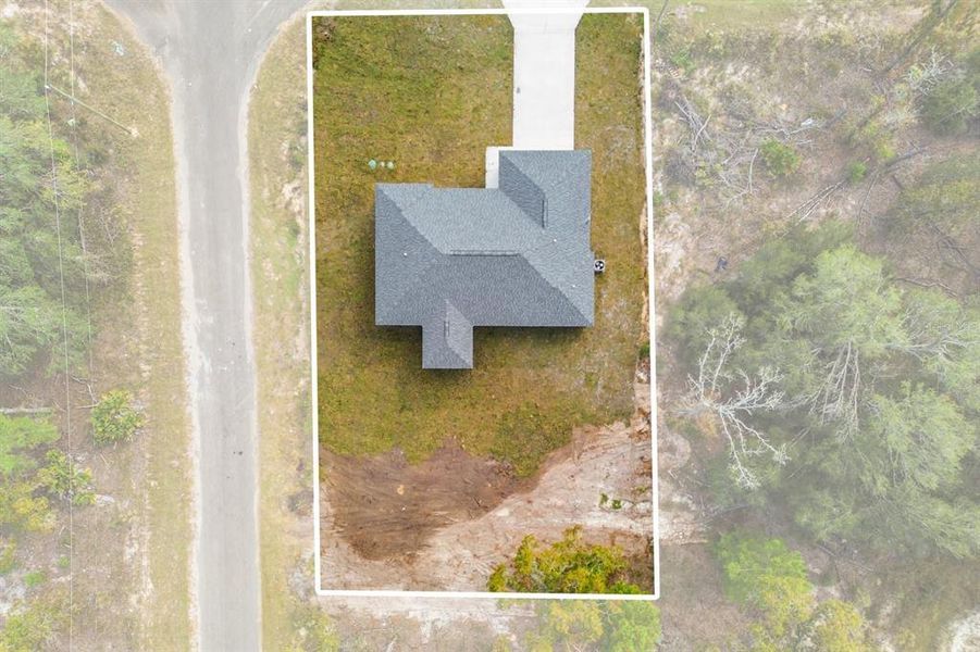 Front exterior of a new home in , Ocklawaha, FL, highlighting curb appeal (Image 23).