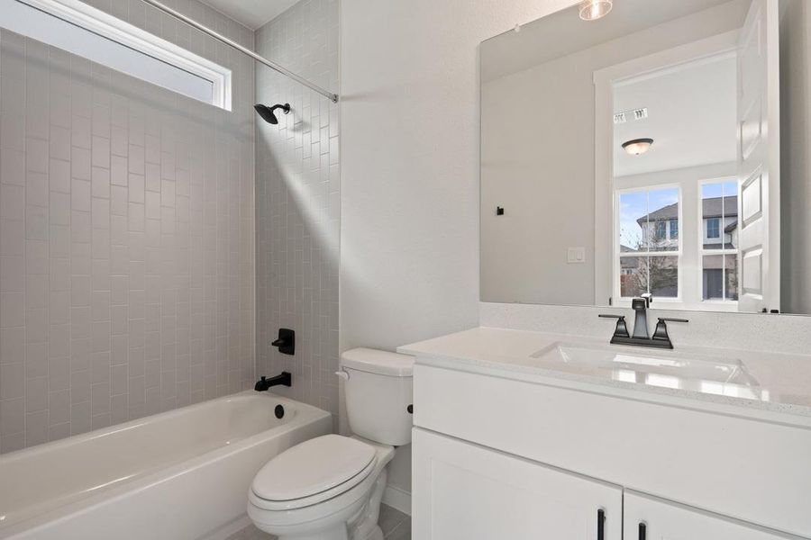 Furnished interior view inside a new home in Lagos Reserve, Manor (Image 13).