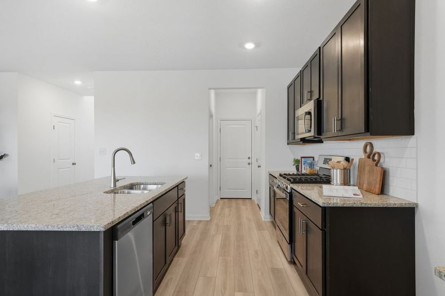 Furnished interior view inside a new home in Longview 40s, Del Valle (Image 9).