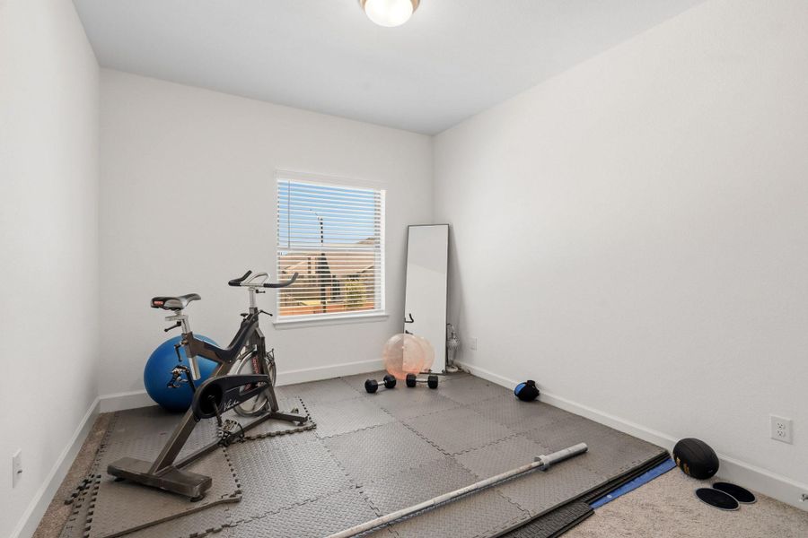 Versatile room ideal for a home gym, office, hobby room, or additional living space