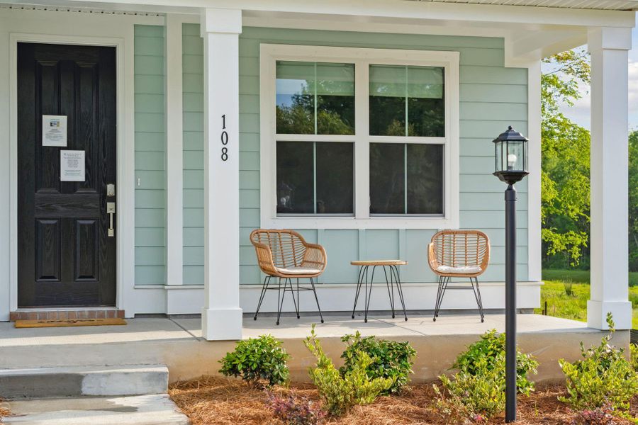 Front exterior of a new home in High Point at Foxbank, Moncks Corner, SC, highlighting curb appeal (Image 22).