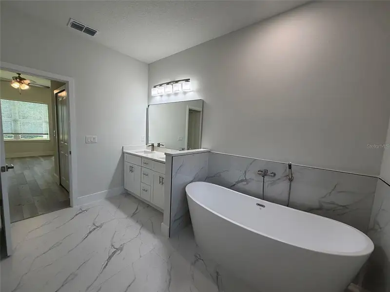 Furnished interior view inside a new home in , Dunnellon (Image 10).