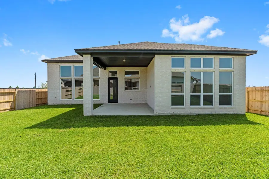 Rear Exterior and Back Yard