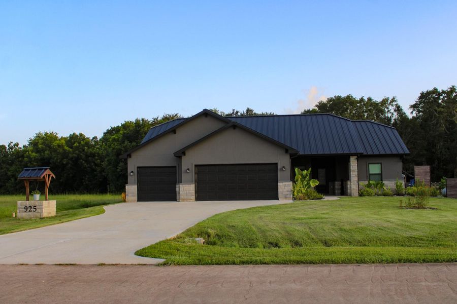 Front exterior of a new home in , Angleton, TX, highlighting curb appeal (Image 17). Front exterior of a new home in , Angleton, TX, highlighting curb appeal (Image 17).