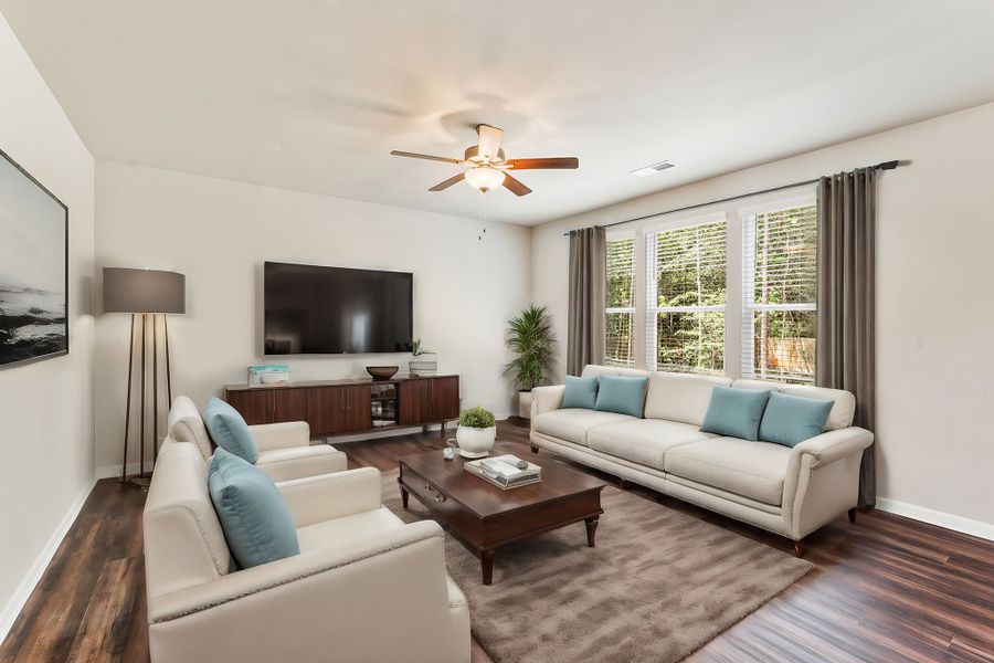 Appealing family room with a wall of windows