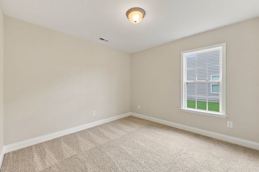 Spacious, unfurnished interior of a new home in Davenport Farms, Winterville (Image 29).