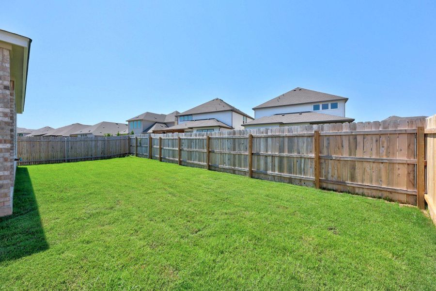 Front exterior of a new home in Retreat at San Gabriel, Georgetown, TX, highlighting curb appeal (Image 19). Front exterior of a new home in Retreat at San Gabriel, Georgetown, TX, highlighting curb appeal (Image 19).