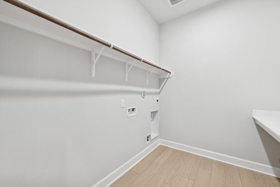 Spacious, unfurnished interior of a new home in Meridiana 55' Homesites, Manvel (Image 17).