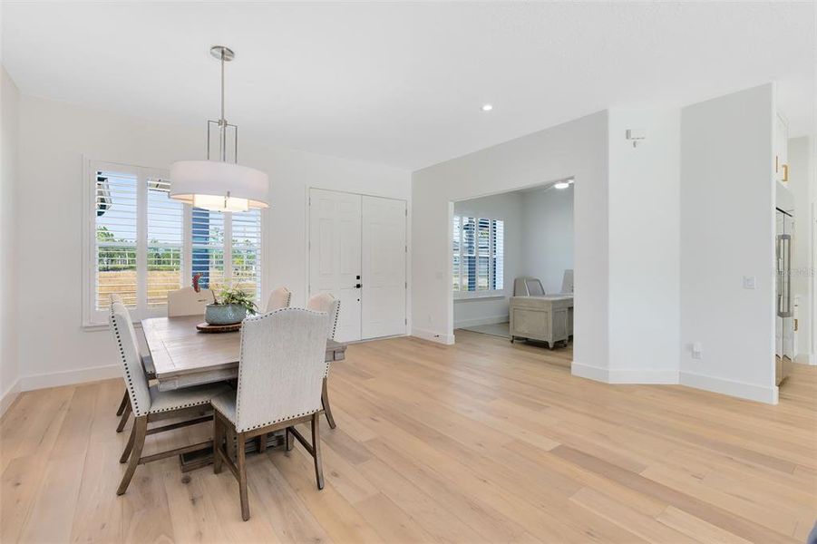 An ample dining area allows for any size dining room table.