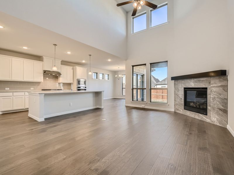 Plan 1533 Living/Kitchen Area Representative Photo by American Legend Homes