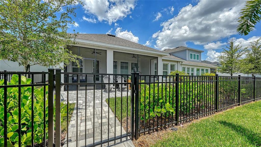 Exterior details and patio area of a home in Emerald Landing at Waterside at Lakewood Ranch – Lake Series, Sarasota (Image 29).