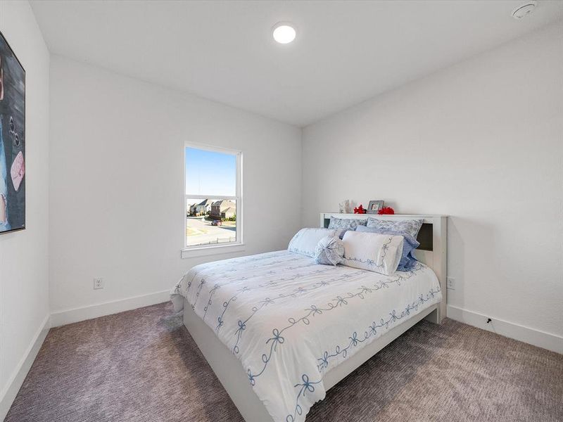 Furnished interior view inside a new home in Royal Court, Little Elm (Image 15).