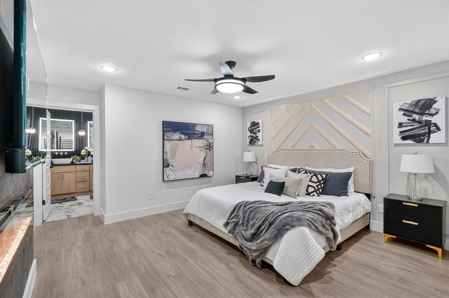 Bedroom featuring wood-finish flooring, recessed lighting, and a contemporary ceiling fan