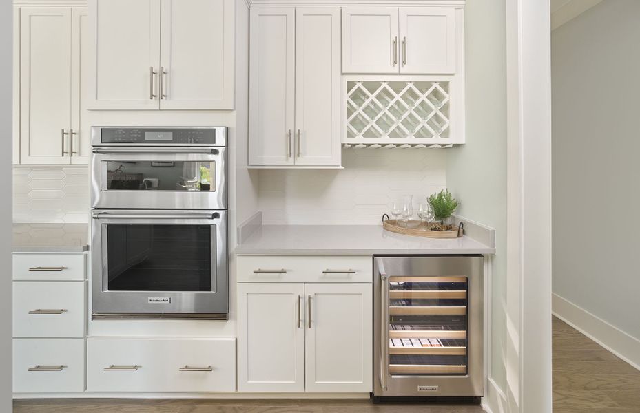 Bright white Beverage Center and wall oven. Bright white Beverage Center and wall oven.