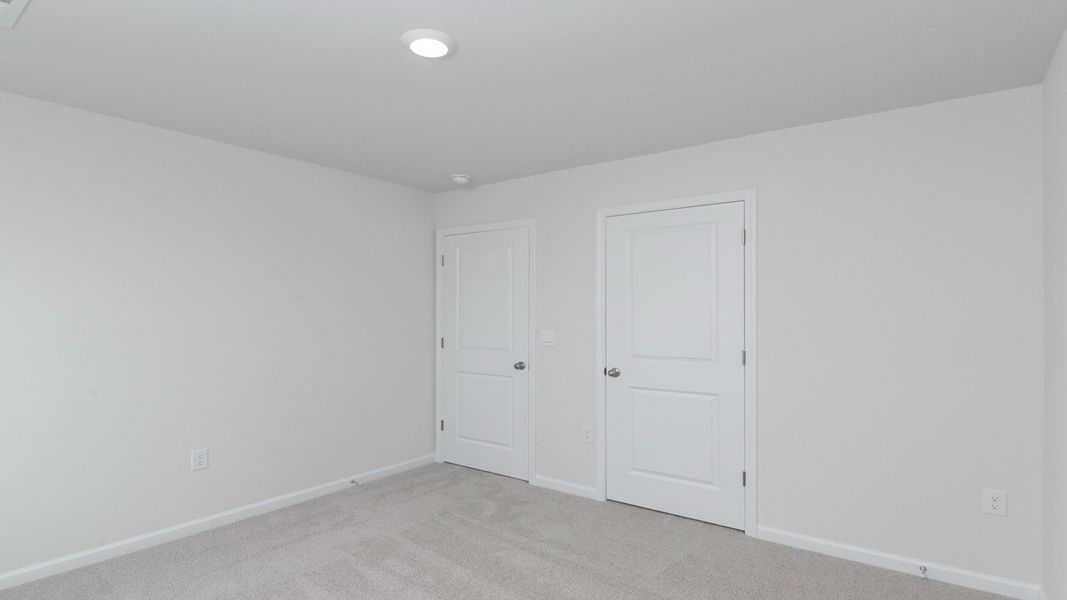 Representative unfurnished interior of a home built from the ROBIE by D.R. Horton in Ferry Grove, Lexington (Image 39).