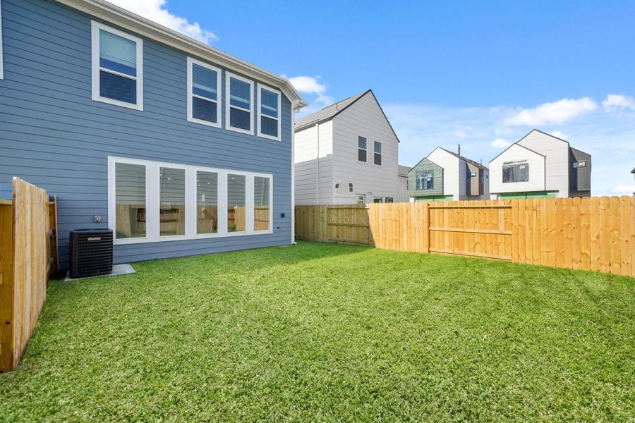 Exterior details and patio area of a home in Piccolina, Houston (Image 3).