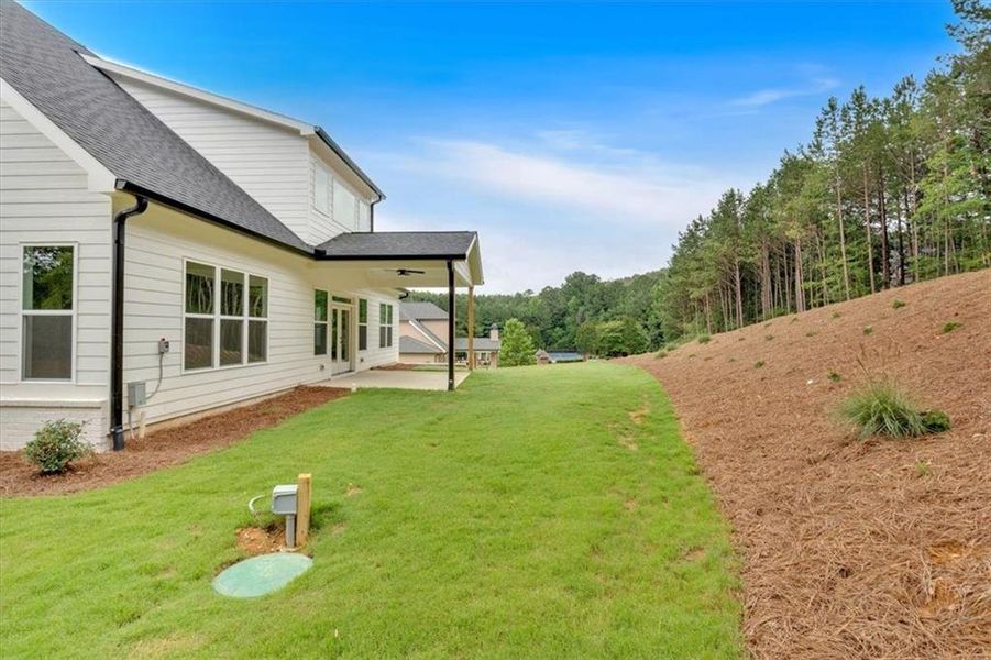 Front exterior of a new home in , Rome, GA, highlighting curb appeal (Image 26).
