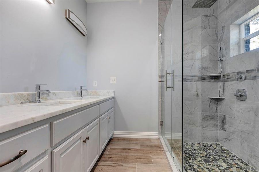 Primary bath with double sinks and a fantastic shower