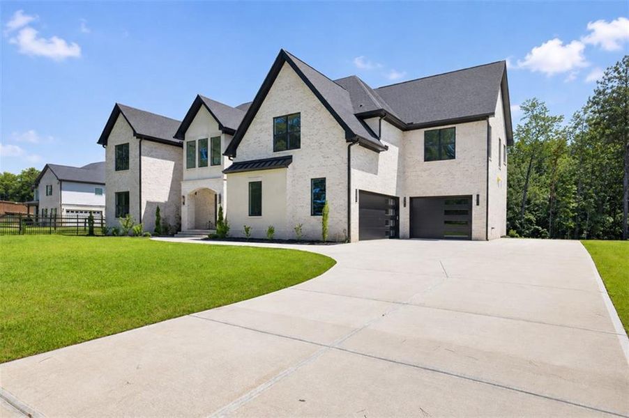 Front exterior of a new home in , Buford, GA, highlighting curb appeal (Image 28).