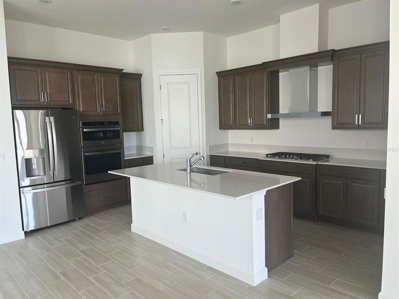 Furnished interior view inside a new home in Tesoro Club, Port St. Lucie (Image 4).