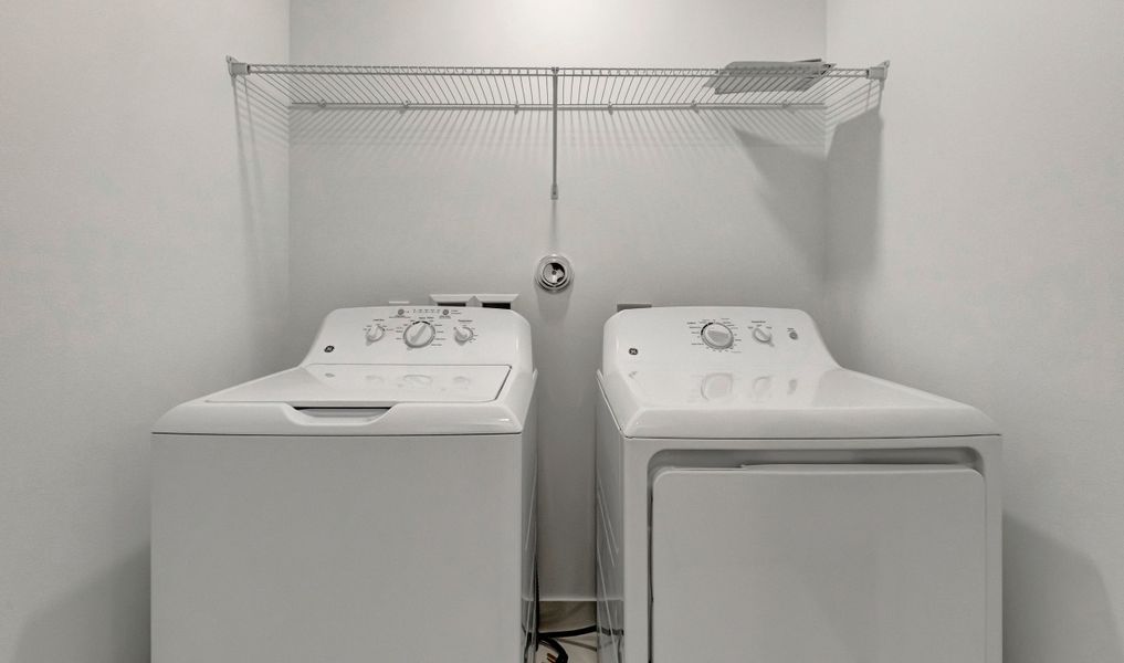 Laundry room with shelf