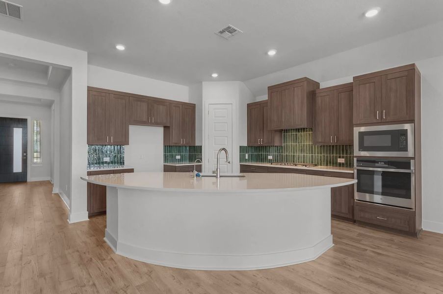 Representative furnished interior of a home built from the Mariah by Chesmar Homes in University Heights, McKinney (Image 7).