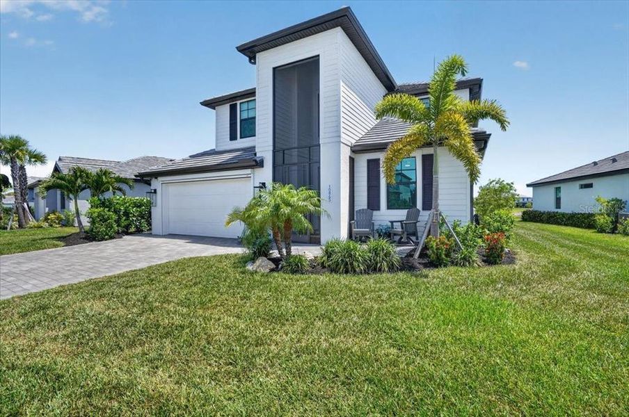 Front exterior of a new home in , Venice, FL, highlighting curb appeal (Image 27). Front exterior of a new home in , Venice, FL, highlighting curb appeal (Image 27).