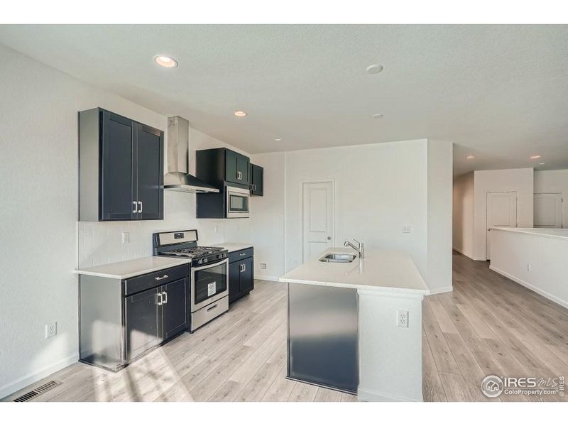 Furnished interior view inside a new home in Farmstead, Berthoud (Image 13).