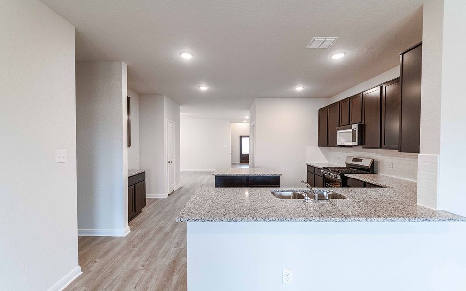 Furnished interior view inside a new home in Hickory Ridge, Elmendorf (Image 3). Furnished interior view inside a new home in Hickory Ridge, Elmendorf (Image 3).