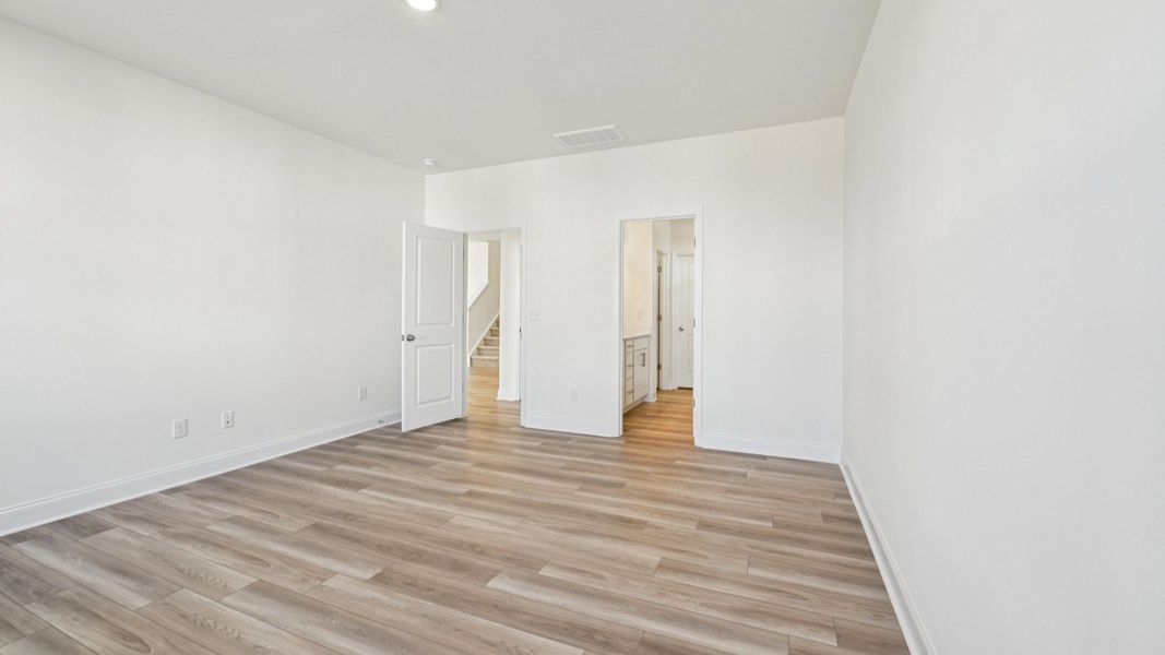 Representative furnished interior of a home built from the Chelsea by DRB Homes in Jasper Landing, Four Oaks (Image 12).