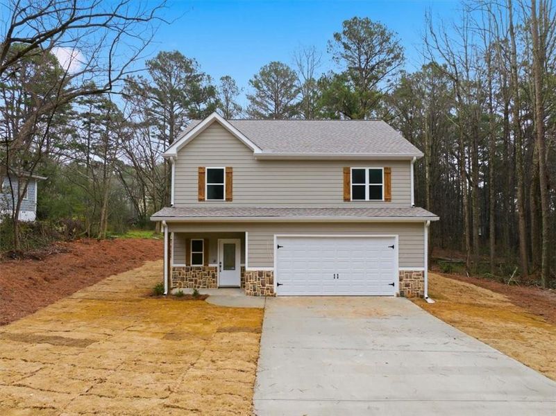 Front exterior of a new home in , Hiram, GA, highlighting curb appeal (Image 1). Front exterior of a new home in , Hiram, GA, highlighting curb appeal (Image 1).