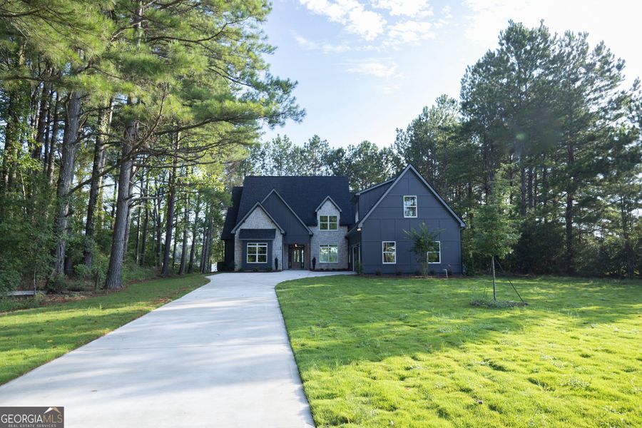 Front exterior of a new home in Leverett Park, Newnan, GA, highlighting curb appeal (Image 2).