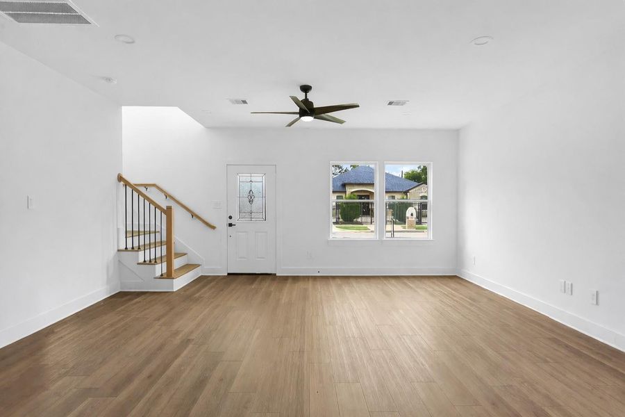 Seamless flow between kitchen, dining, and living room.