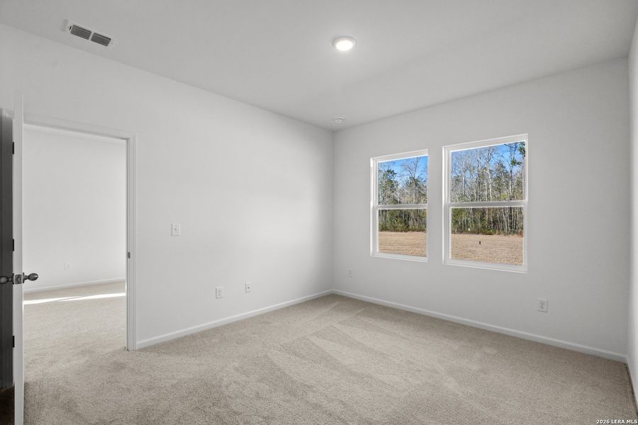 Spacious, unfurnished interior of a new home in Sutton Farms, San Antonio (Image 20).