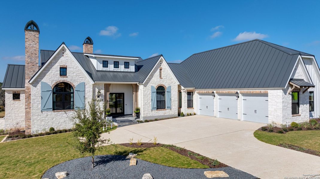 Front exterior of a new home in , Kerrville, TX, highlighting curb appeal (Image 1).