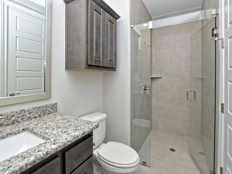 Representative furnished interior of a home built from the Madera II by Giddens Homes in Scofield Farms Estates, Georgetown (Image 181).