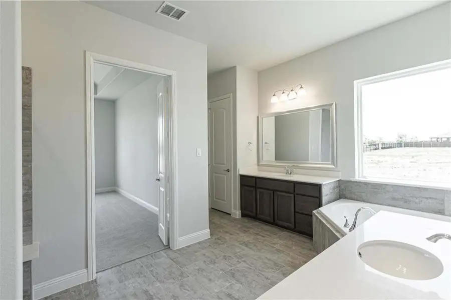 Representative furnished interior of a home built from the Brennan by Pacesetter Homes in Timberbrook, Justin (Image 6).
