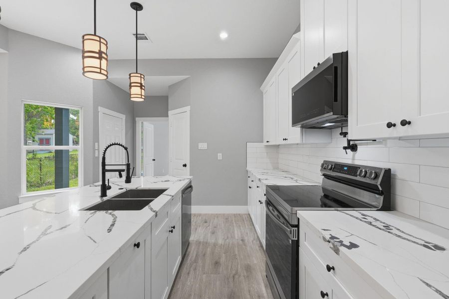 Furnished interior view inside a new home in , Willis (Image 11).