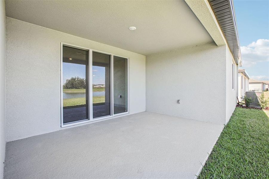 Exterior details and patio area of a home in Two Rivers - Signature Series, Zephyrhills (Image 22).