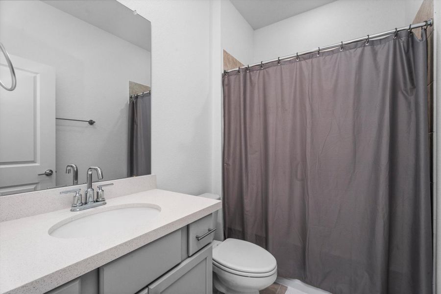 Furnished interior view inside a new home in Mason Woods, Cypress (Image 13).