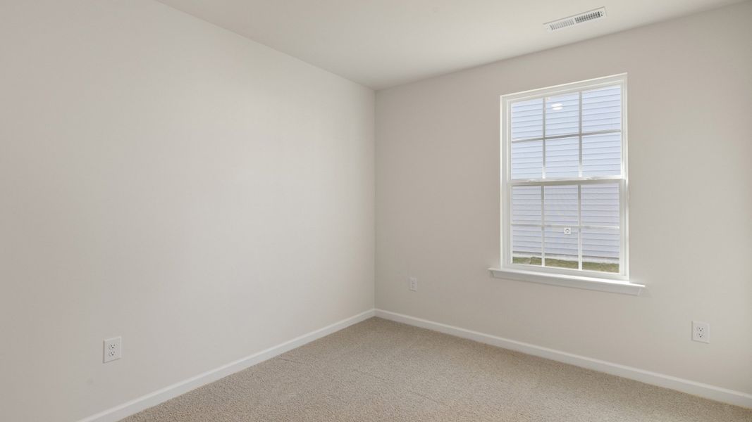 Representative unfurnished interior of a home built from the Freeport by D.R. Horton in Blair Ridge, La Grange (Image 9).