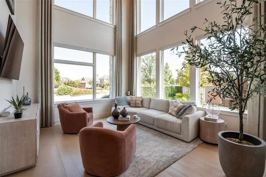 Living room with soaring 2 story ceiling