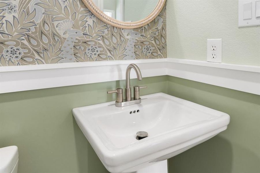 Bathroom with sink and toilet