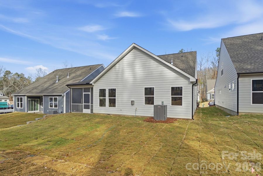 Exterior details and patio area of a home in Villas at Prestwick, Mooresville (Image 4).