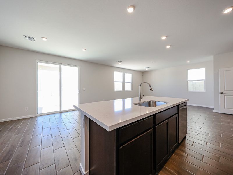 A kitchen with a large island.