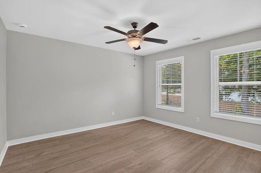 Spacious, unfurnished interior of a new home in The Cottages at East Lanier, Fayetteville (Image 17).