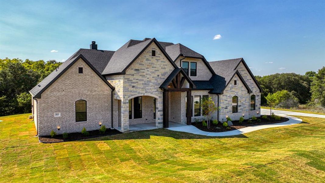 View of front of house with a front yard