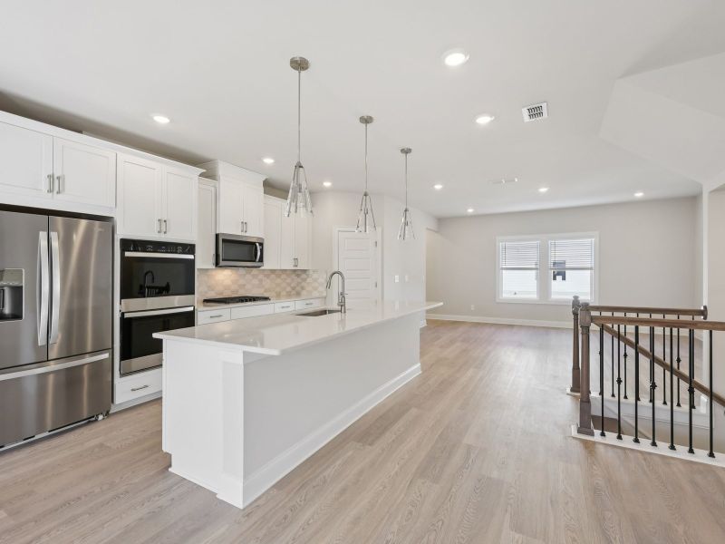Furnished interior view inside a new home in Martin Springs - Highland Series, Lawrenceville (Image 4).