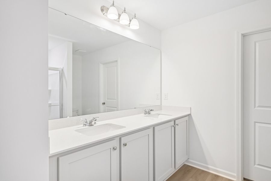 Representative furnished interior of a home built from the Brooke by Ashton Woods in Middleton Farms, Middlesex (Image 10).